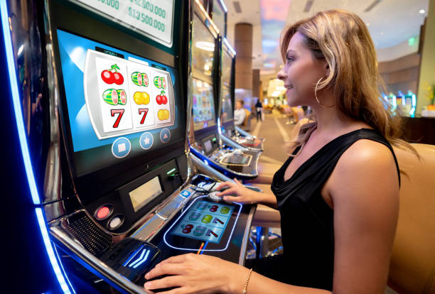 Live dealer studio with card table and multiple camera angles showing Hood vs Wolf game